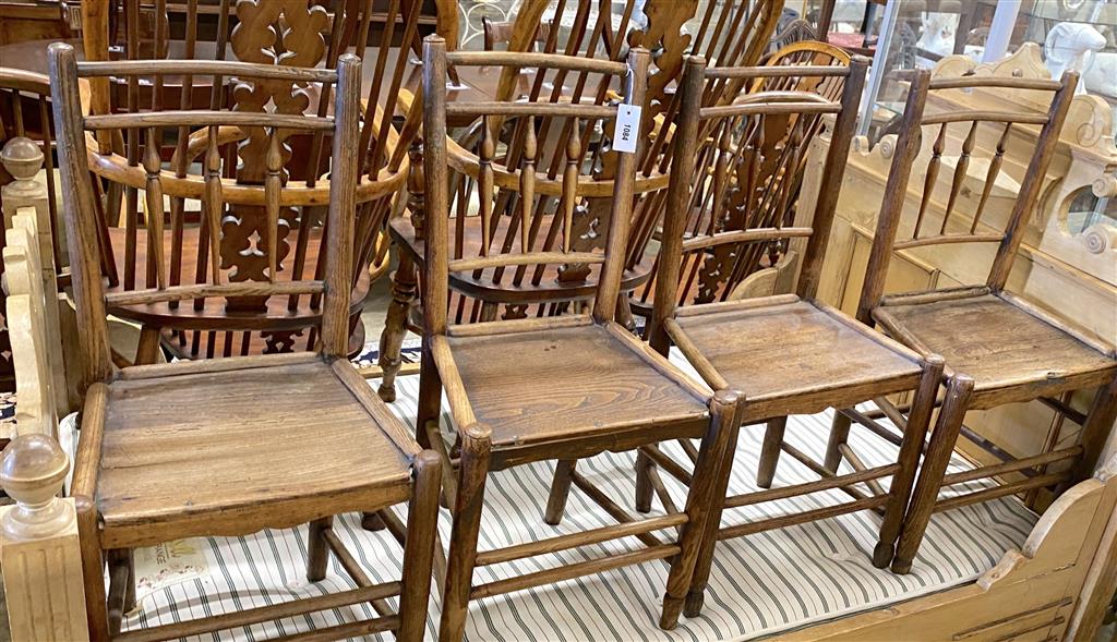 A set of four 19th century provincial ash and elm wood seat dining chairs
